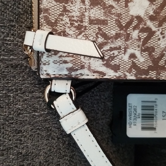 Nwt DKNY medium brown graffiti wristlet. Retails $78 - Picture 4 of 8
